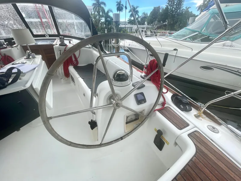 Slide: The Image of Steering wheel of 2009 Beneteau Oceanis 43 yacht in harbor. - 37