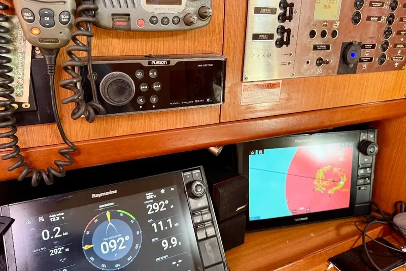 Slide: The Image of Control panel of a 2009 Beneteau Oceanis 43 sailboat with navigation equipment. - 57
