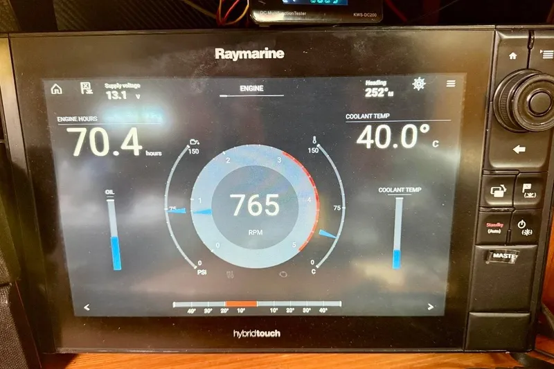 Slide: The Image of Raymarine display showing engine data for 2009 Beneteau Oceanis 43 sailboat. - 60