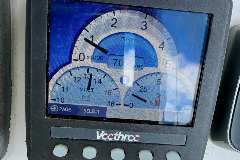 Slide: The Image of Instrument panel of a 2009 Beneteau Oceanis 43 sailboat displaying RPM and voltage. - 63
