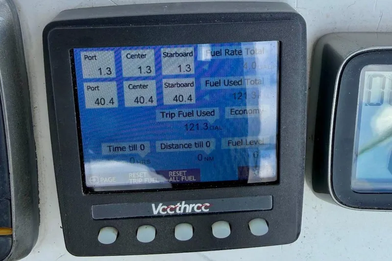 Slide: The Image of Fuel monitor display on 2009 Beneteau Oceanis 43, showing fuel rate and usage details. - 64