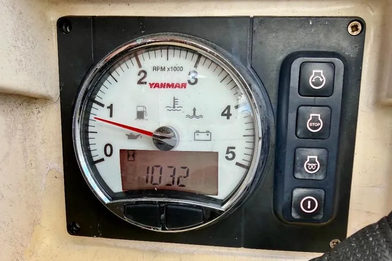 Slide: The Image of Yanmar engine gauge on 2009 Beneteau Oceanis 43 sailboat, displaying 1032 hours. - 68