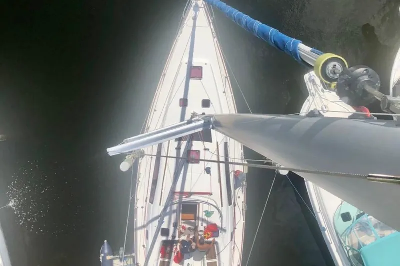 Slide: The Image of Aerial view of 2009 Beneteau Oceanis 43 sailboat docked, showing mast and deck details. - 92