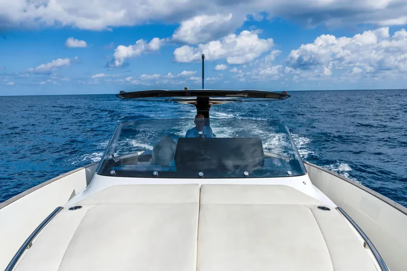 Slide: The Image of 2024 Solaris Power 44 Open yacht cruising on open sea under blue sky. - 16