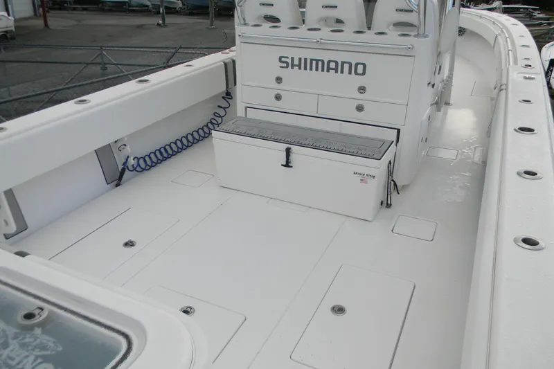 Slide: The Image of 2022 Contender 39 ST boat deck with Shimano storage and seating. - 10