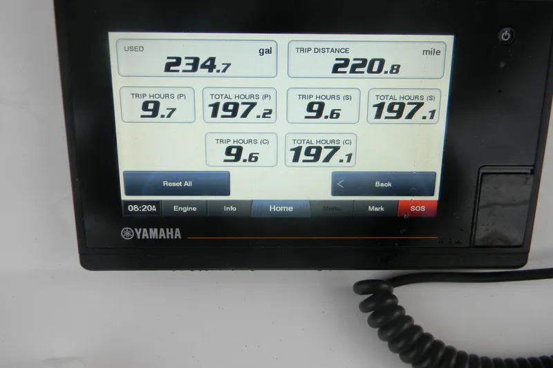 Slide: The Image of Yamaha display showing fuel usage and trip data for 2022 Contender 39 ST boat. - 3