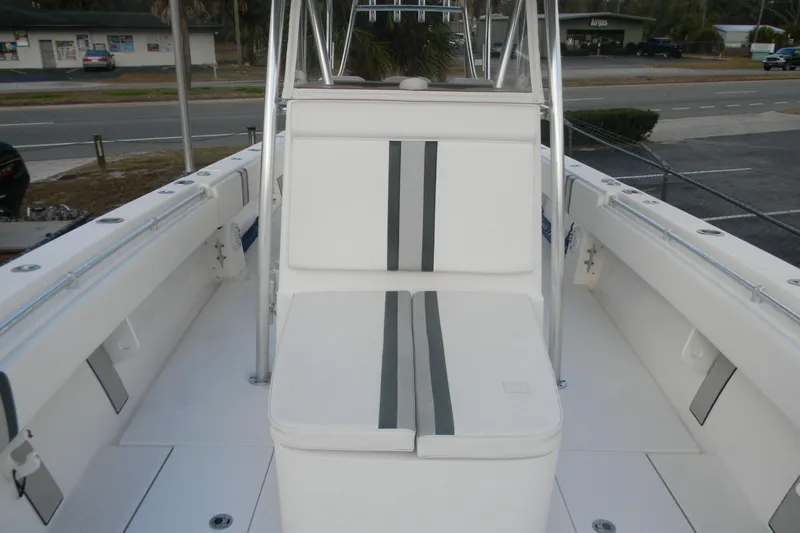 Slide: The Image of 2022 Contender 39 ST boat interior with white seating and sleek design. - 5
