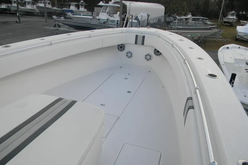 Slide: The Image of 2022 Contender 39 ST boat interior with spacious deck and seating area. - 6