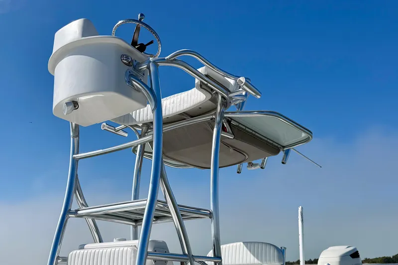 Slide: The Image of 2019 Aquasport 244 Bay boat tower against clear blue sky. - 17