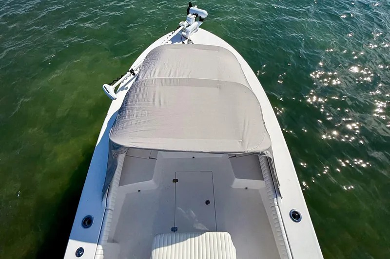 Slide: The Image of 2019 Aquasport 244 Bay boat on sparkling water, top view. - 9