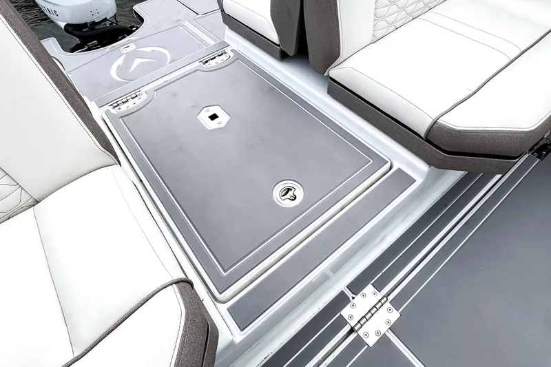 Slide: The Image of 2026 Ingenity EL boat interior with sleek seating and storage compartment. - 12