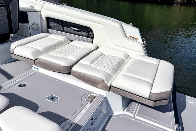 Slide: The Image of Luxury seating on 2026 Ingenity EL boat, featuring elegant white and gray upholstery. - 30