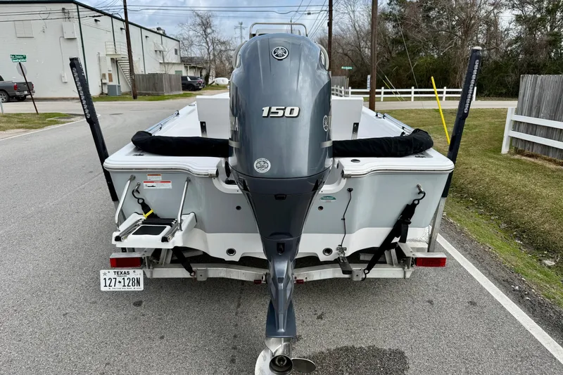 Slide: The Image of 2020 Sportsman Tournament 214 SBX Bay Boat with Yamaha 150 engine on trailer. - 3