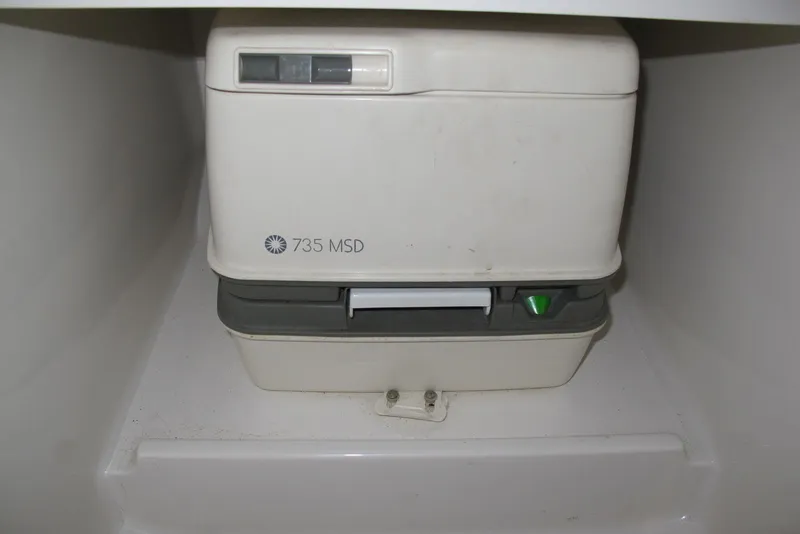 Slide: The Image of Portable toilet in 2003 Chris-Craft Corsair 25 Heritage Edition boat. - 9