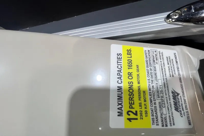 Slide: The Image of Capacity label on 2023 Cypress Cay Seabreeze 232, max 12 persons or 1650 lbs. - 15