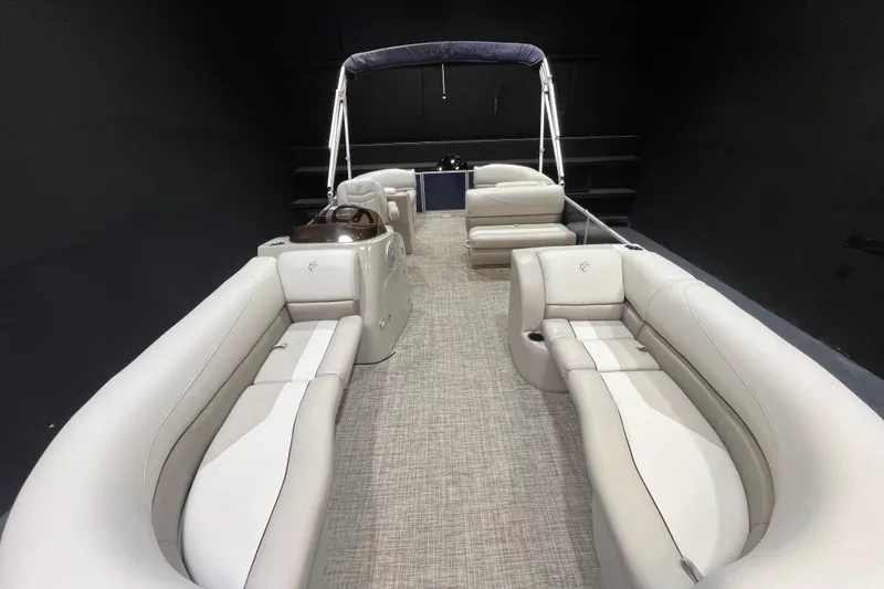 Slide: The Image of 2023 Cypress Cay Seabreeze 232 pontoon boat interior with plush seating and modern design. - 6