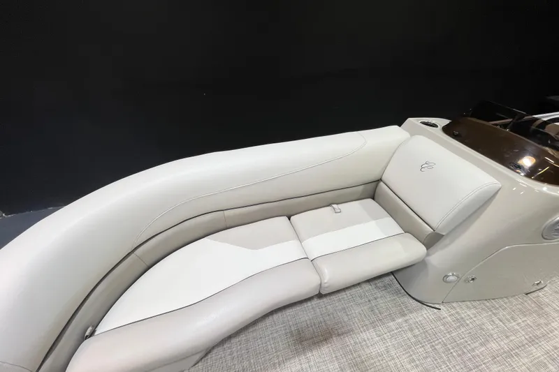 Slide: The Image of 2023 Cypress Cay Seabreeze 232 boat interior with elegant white seating. - 8