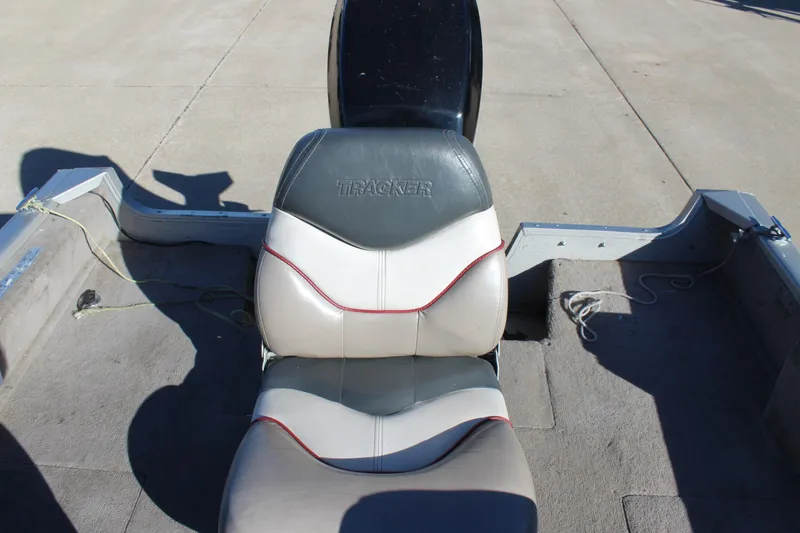 Slide: The Image of 2004 Tracker Pro Angler V 16 boat seat, gray and white with red accents. - 15