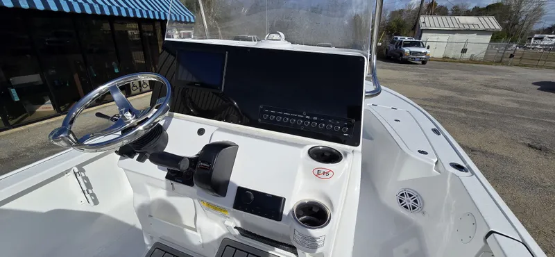 Slide: The Image of Interior view of 2026 Tidewater 2110BMT boat with steering console. - 12