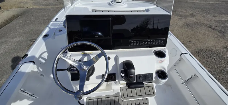 Slide: The Image of Tidewater 2110BMT boat steering console, year 2026. - 7