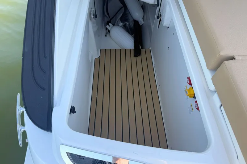 Slide: The Image of Storage compartment in Sea Ray SLX 260 Outboard 2026 boat. - 10