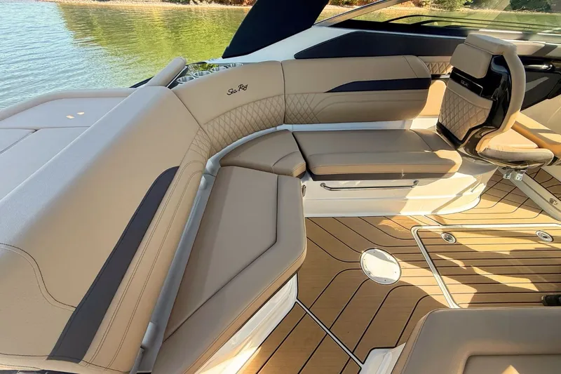 Slide: The Image of Interior of 2026 Sea Ray SLX 260 Outboard with luxurious seating. - 16
