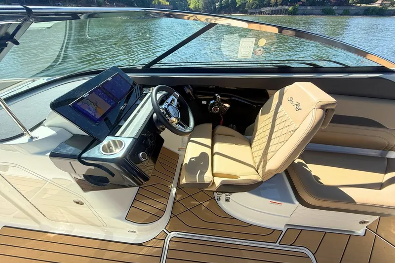 Slide: The Image of Interior of 2026 Sea Ray SLX 260 Outboard with luxurious cockpit. - 20