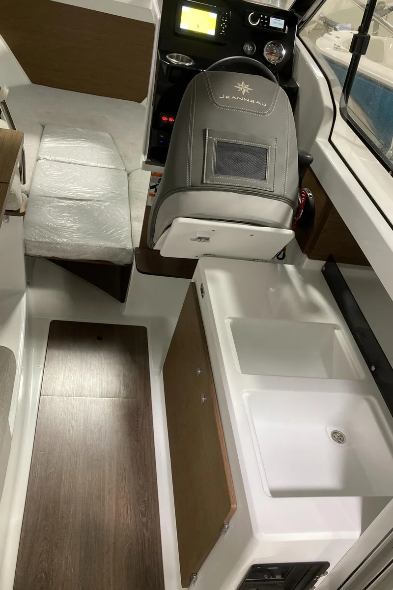 Slide: The Image of Interior of Jeanneau NC Weekender 695 Series 2, 2022 model. - 16