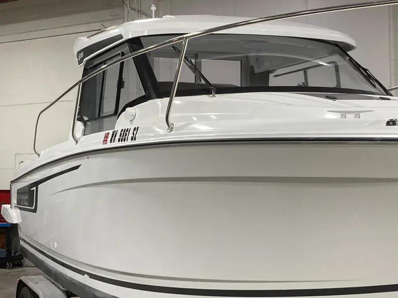 Slide: The Image of 2022 Jeanneau NC Weekender 695 Series 2 boat in a warehouse. - 4