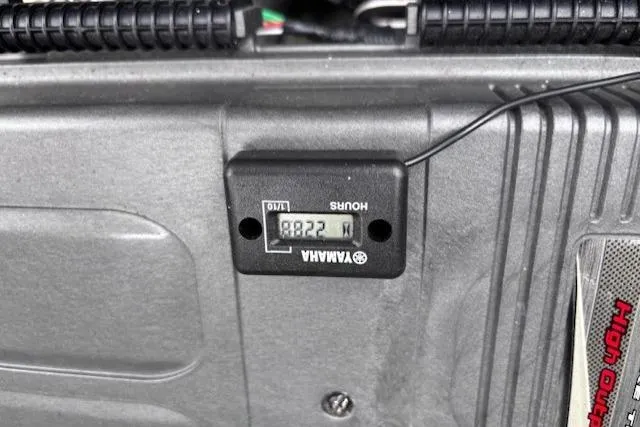 Slide: The Image of Hour meter on 2009 Yamaha Boats AR230 HO, displaying 882.7 hours. - 12