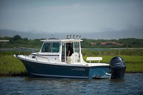 Slide: The Image of 2026 Steiger Craft 21 Miami boat on water, featuring Yamaha outboard motor. - 5