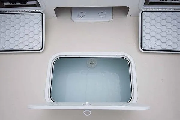 Slide: The Image of 2026 Steiger Craft 21 Miami boat storage compartments with open hatches. - 9