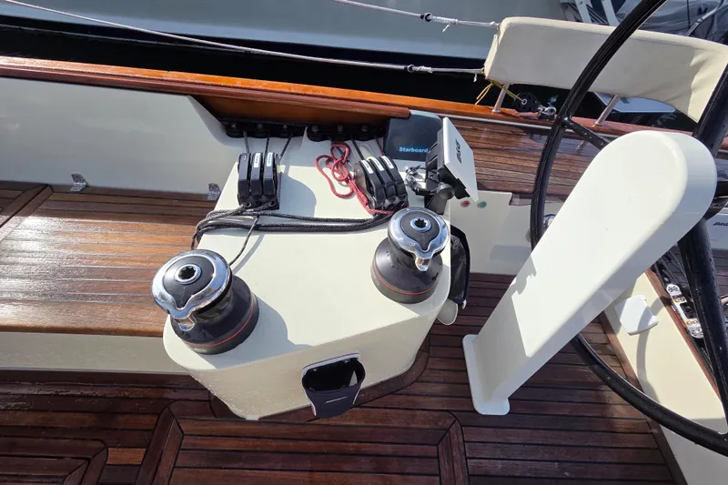 Slide: The Image of Cockpit of 2018 Tofinou 12 sailboat with winches and steering wheel. - 10