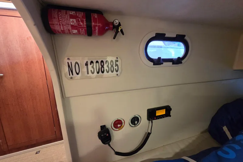 Slide: The Image of Interior of a 2018 Tofinou 12 boat with fire extinguisher and equipment. - 20