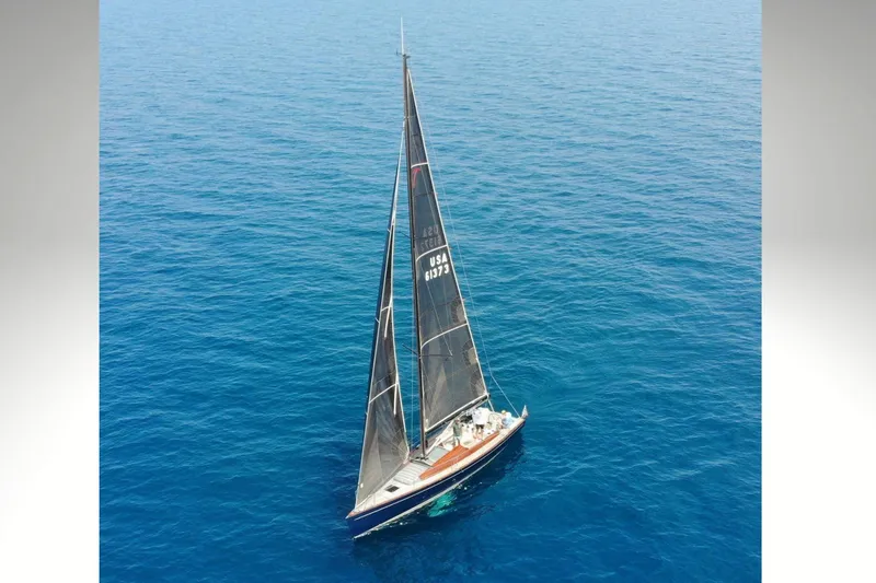 Slide: The Image of Aerial view of 2018 Tofinou 12 sailboat on open blue sea. - 30