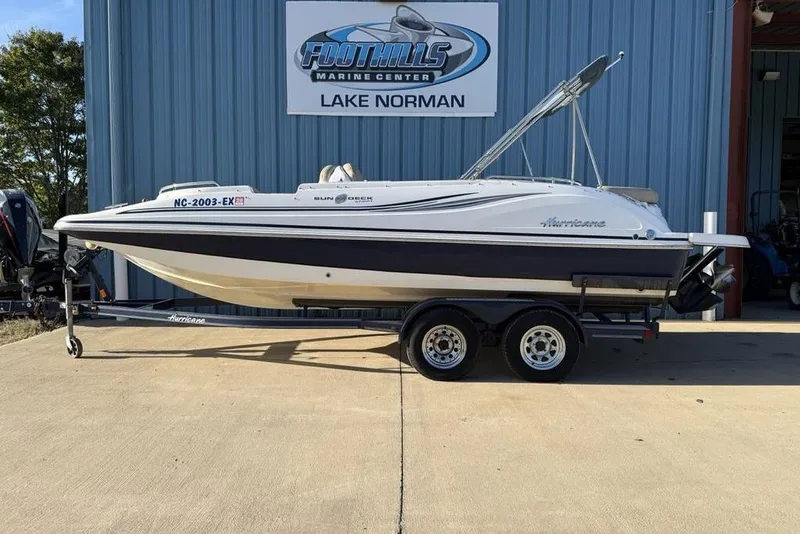 The Image of 2015 Hurricane SunDeck Sport 202 IO boat on trailer at Foothills Marine Center. - 0