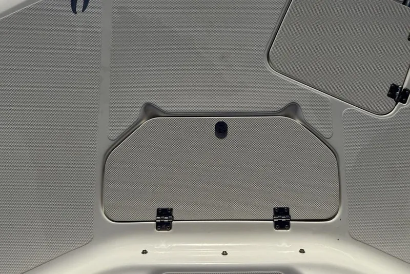 Slide: The Image of 2015 Hurricane SunDeck Sport 202 IO boat deck with storage compartments. - 11