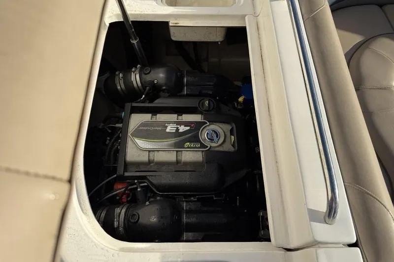 Slide: The Image of 2015 Hurricane SunDeck Sport 202 IO engine compartment with visible MerCruiser engine. - 29