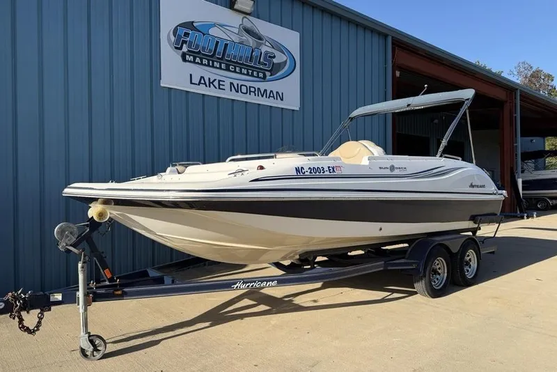 Slide: The Image of 2015 Hurricane SunDeck Sport 202 IO boat on trailer at Foothills Marine Center. - 3