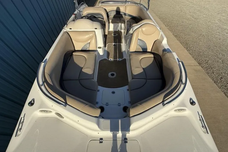 Slide: The Image of 2015 Hurricane SunDeck Sport 202 IO boat interior with beige seating and spacious layout. - 31