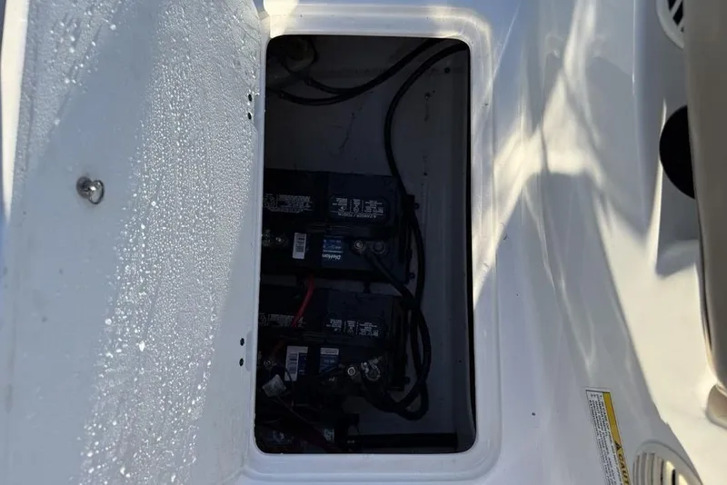 Slide: The Image of Battery compartment of a 2015 Hurricane SunDeck Sport 202 IO boat. - 32