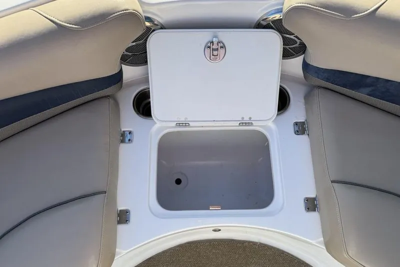 Slide: The Image of 2015 Hurricane SunDeck Sport 202 IO boat interior with open storage compartment. - 9