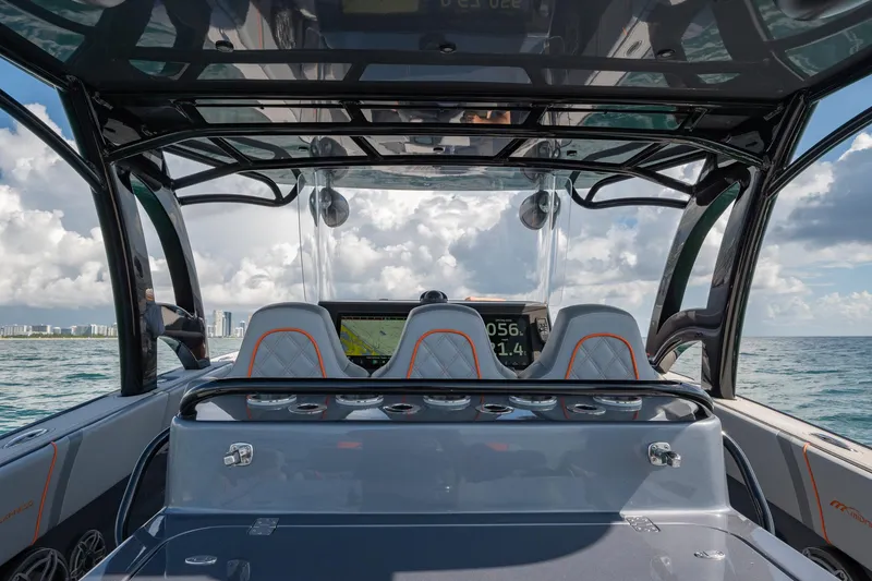 Slide: The Image of 2022 Midnight Express 37' Open boat interior with ocean view. - 13