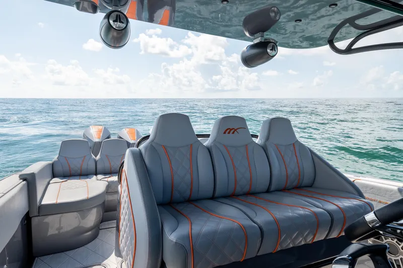 Slide: The Image of Luxury seating on 2022 Midnight Express 37' Open boat, ocean view. - 26