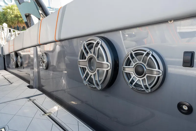 Slide: The Image of 2022 Midnight Express 37' Open boat with sleek audio speakers on deck. - 32