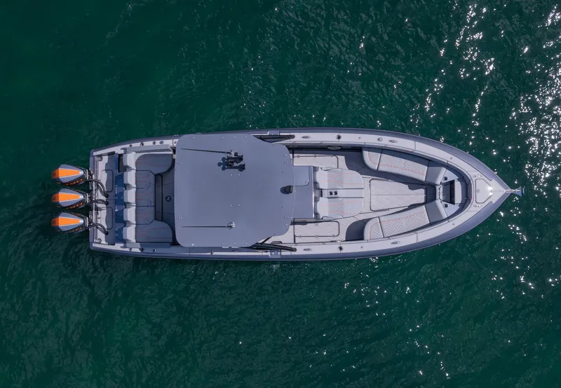 Slide: The Image of Aerial view of 2022 Midnight Express 37' Open boat on water. - 7