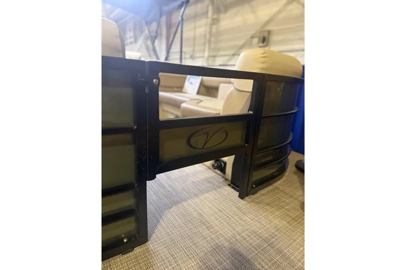 Slide: The Image of 2026 Veranda VISTA 22FRC Tri-toon boat interior with beige seating and black railing. - 11