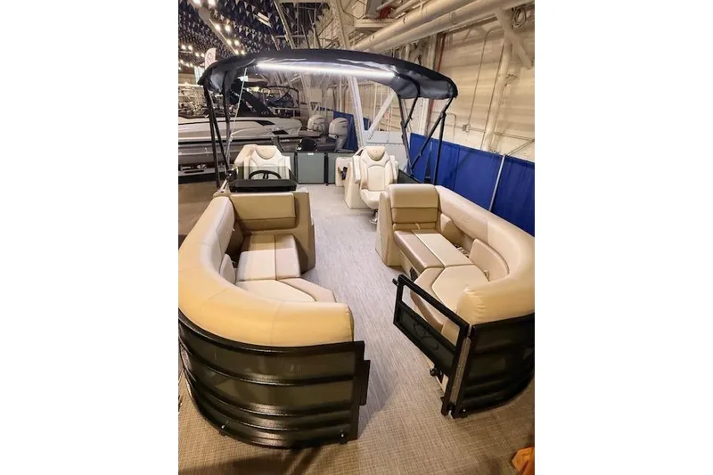 Slide: The Image of 2026 Veranda VISTA 22FRC Tri-toon with spacious seating and canopy in showroom. - 3
