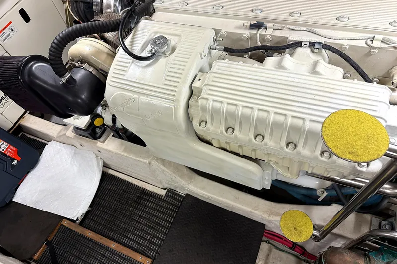 Slide: The Image of Engine compartment of a 2004 Tiara Yachts 4200 Open, showcasing detailed components. - 18