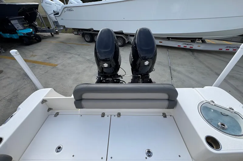 Slide: The Image of 2022 Sea Born LX24 Center Console with dual Suzuki outboard motors. - 35